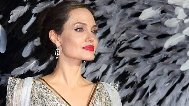 The Oscar-winning actress made the claim in newly filed court documents ahead of her and Pitt's divorce trial. An insider close to Pitt has denied the claim.