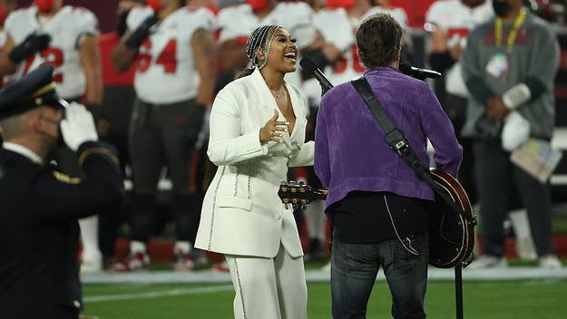 The grammy-nominated R&B singer and country music star joined forces before Sunday night's Super Bowl game in Tampa to perform the National Anthem.