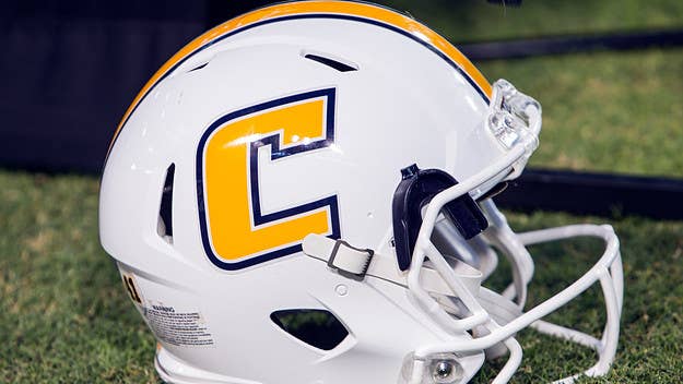The University of Tennessee at Chattanooga fired an assistant football coach after he wrote a racist tweet targeting Stacey Abrams and the Georgia election.