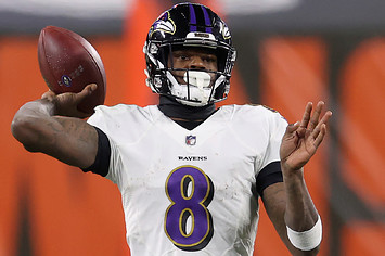 Lamar Jackson #8 of the Baltimore Ravens attempts a pass