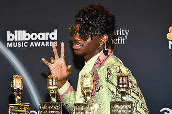 Lil Nas X poses backstage at the 2020 Billboard Music Awards