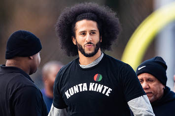 Colin Kaepernick looks on during his NFL workout held at Charles R Drew high school