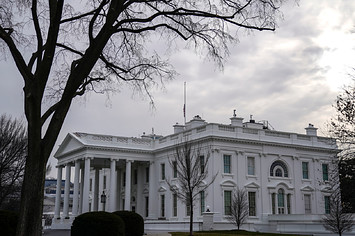 American flag flies at half staff over the White House.