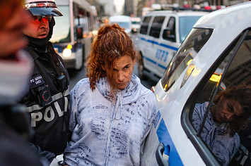 A woman is arrested by the NYPD during a ICE protest