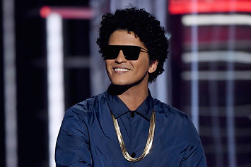 Recording artist Bruno Mars speaks during the 2018 Billboard Music Awards