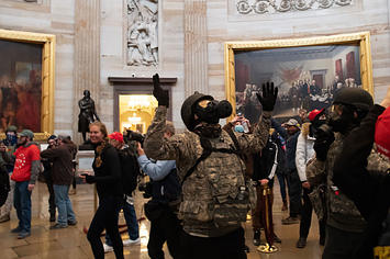Chaos breaks out during the riot at the Capitol.