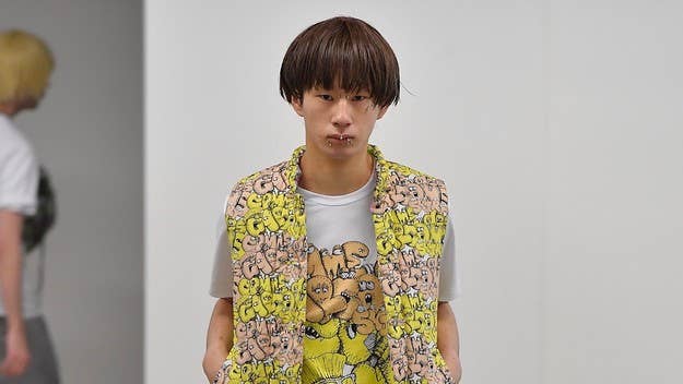 The Japanese label showcased the collaborative designs during its Fall/Winter 2021 “mini-show." The range features a mix of repurposed and original Kaws work.