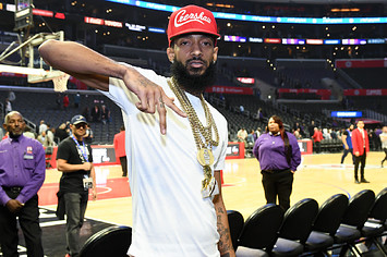 Nipsey Hussle attends a basketball game