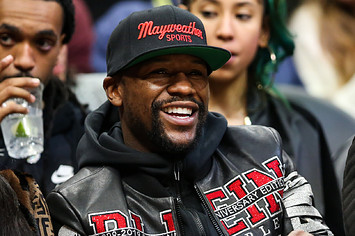 Floyd Mayweather is seen at a game between the Hawks and Bucks.