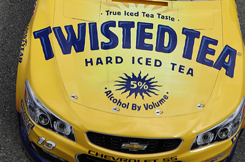 Ty Dillon, driver of the #13 Twisted Tea Chevrolet, drives through the garage during practice.