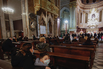 Parishioners wearing masks at a church service