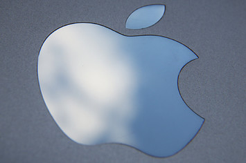 In this photo illustration the logo on an Apple iPad is seen.