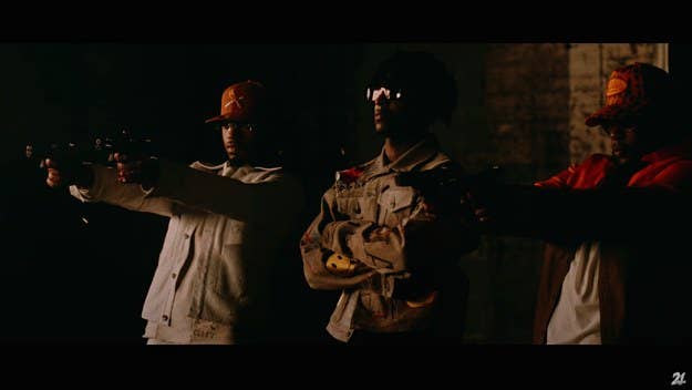 21 Savage and Metro Boomin have dropped a deeply cinematic and pretty startling music video for 'Savage Mode II's latest single, “Glock In My Lap.”