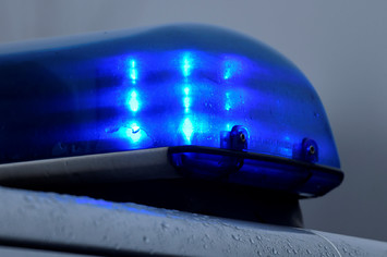 Flashing blue light of a police car in Datteln, western Germany.