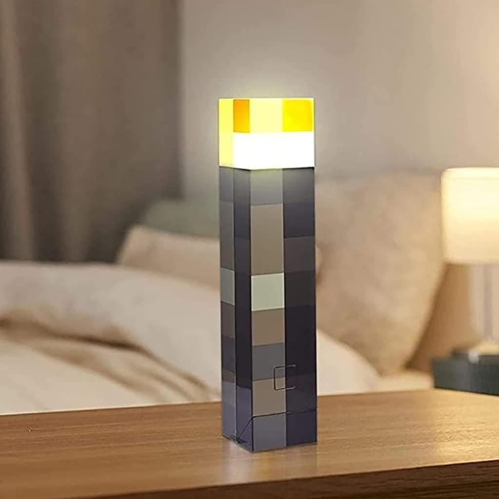 The torch light on a bedside table