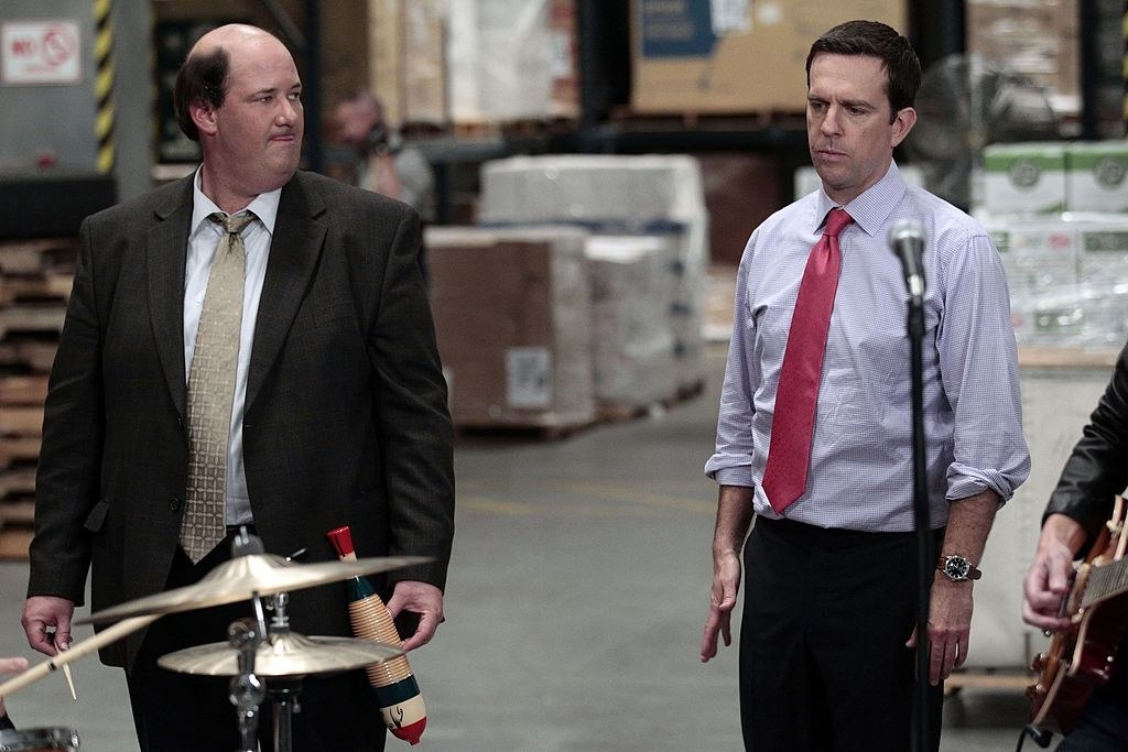 Brian and Ed in a warehouse scene from the show