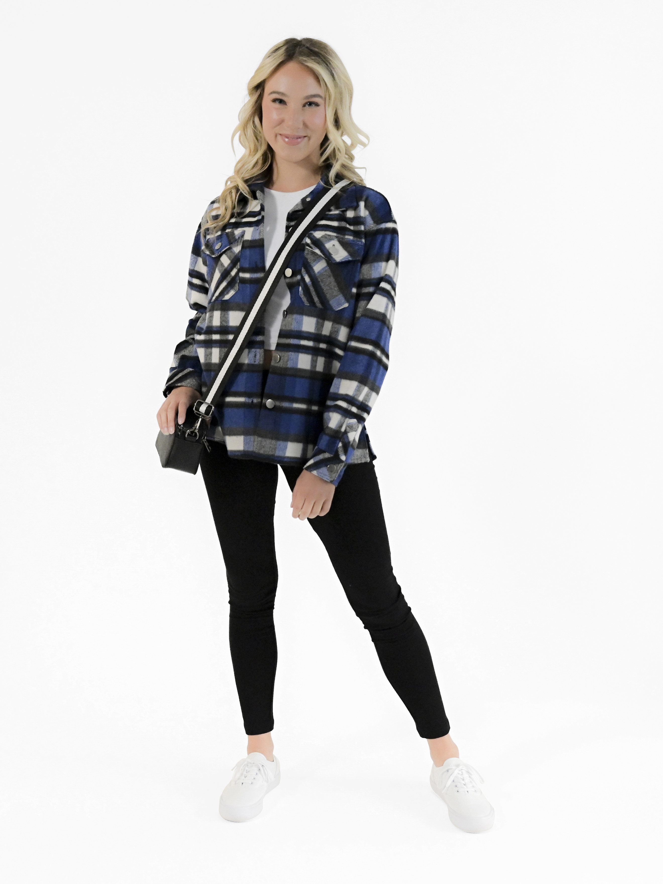 model wearing the blue and black and white plaid shacket