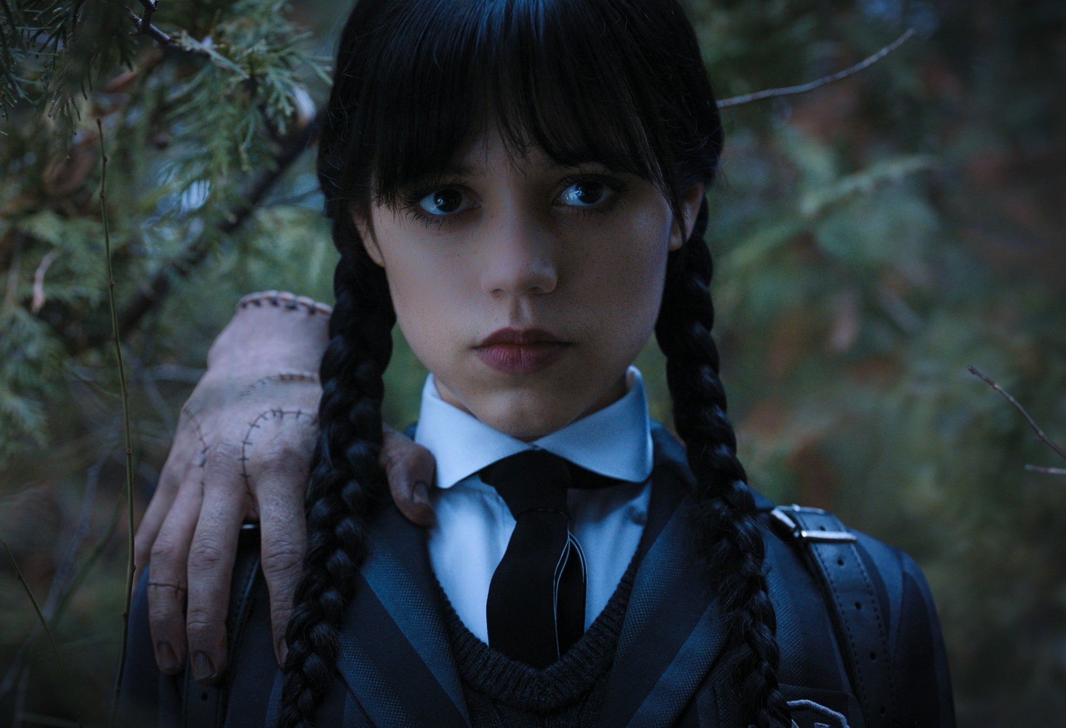 Jenna Ortega and Thing in Wednesday