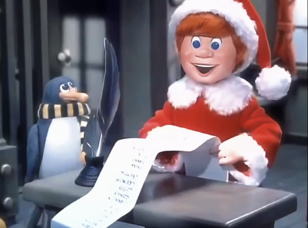 Santa&#x27;s elf going over a list