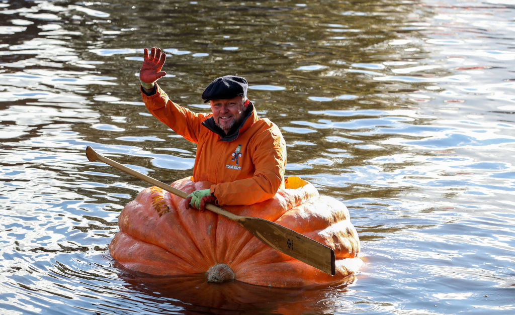 Tom Pearcy in his pumpkin boat