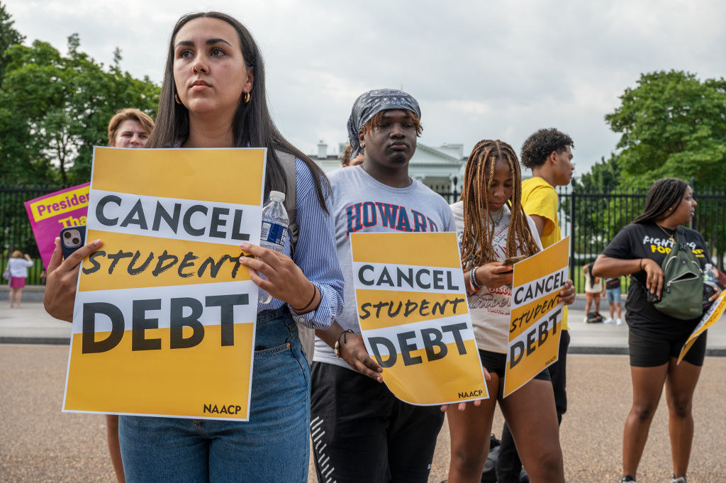 young people protesting against student debt