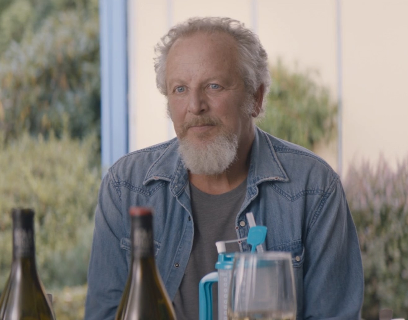 Daniel Stern as Bill eats a meal with family and friends in &quot;Shrill&quot;