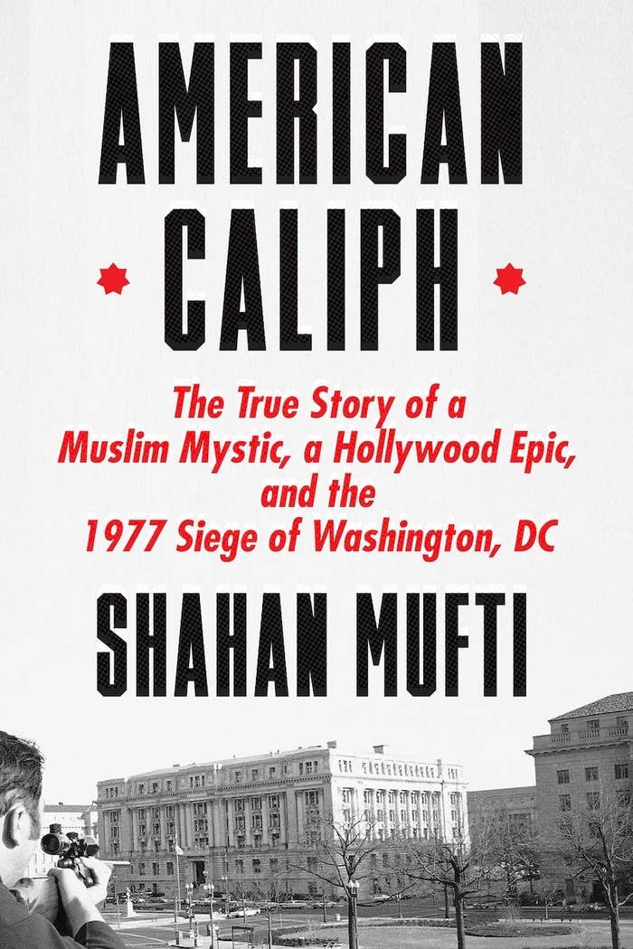 book cover for &quot;American Caliph: The True Story of a Muslim Mystic, a Hollywood Epic, and the 1977 Siege of Washington, DC&quot; which is a black-and-white photo of a man taking a photo of a building on a winter day