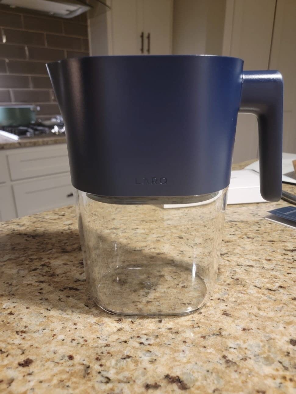 a reviewer&#x27;s pitcher in black