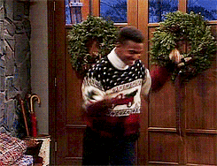 Carlton dancing in a Christmas sweater