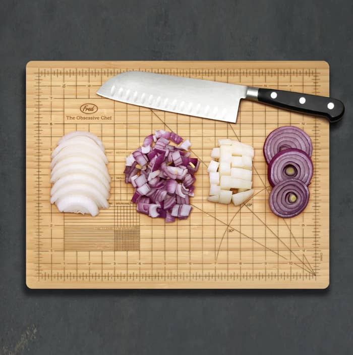 Four lil&#x27; piles of onion sliced in different ways on the cutting board