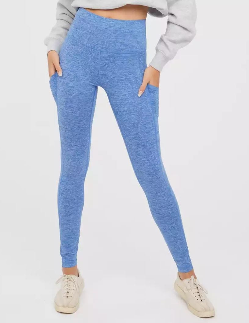 model wearing light blue high waisted leggings