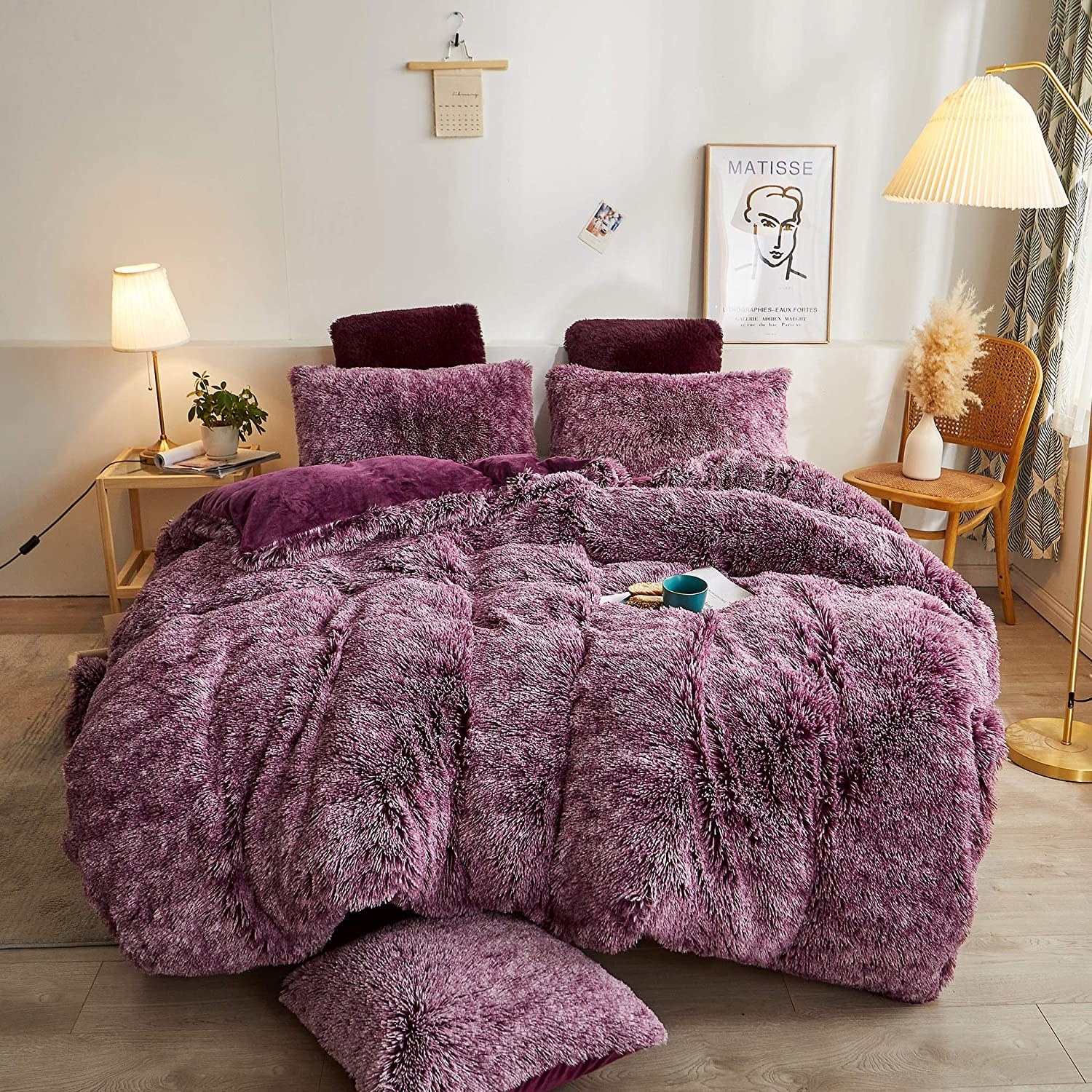 a fluffy duvet cover set on a bed