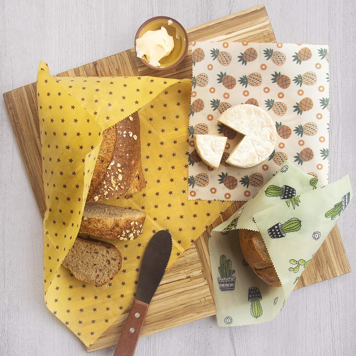 cute wax wraps covering various ingredients on a cutting board