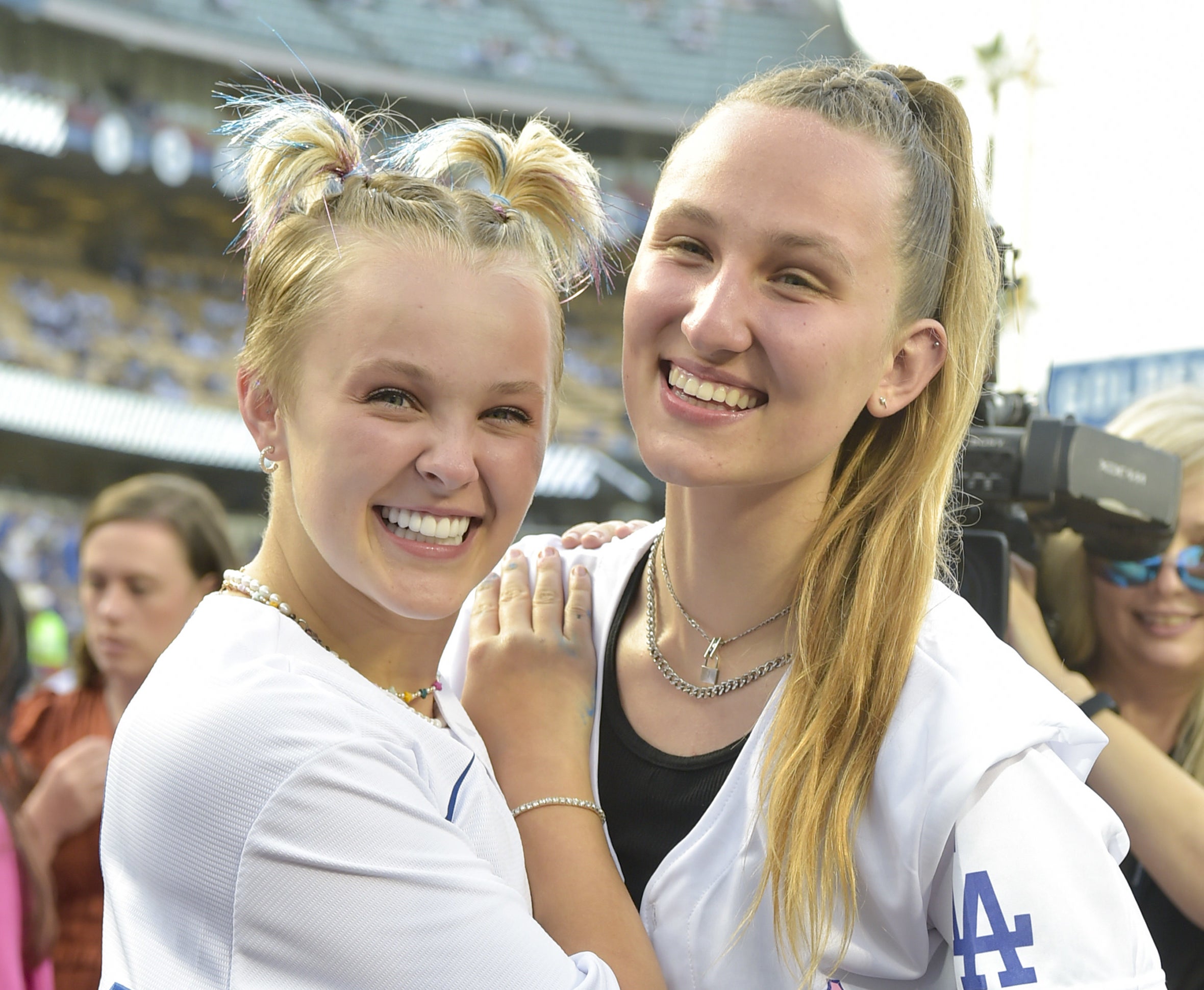 closeup of the two at a baseball game