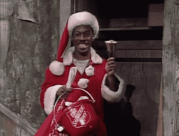 Eddie Murphy dressed as Santa Claus