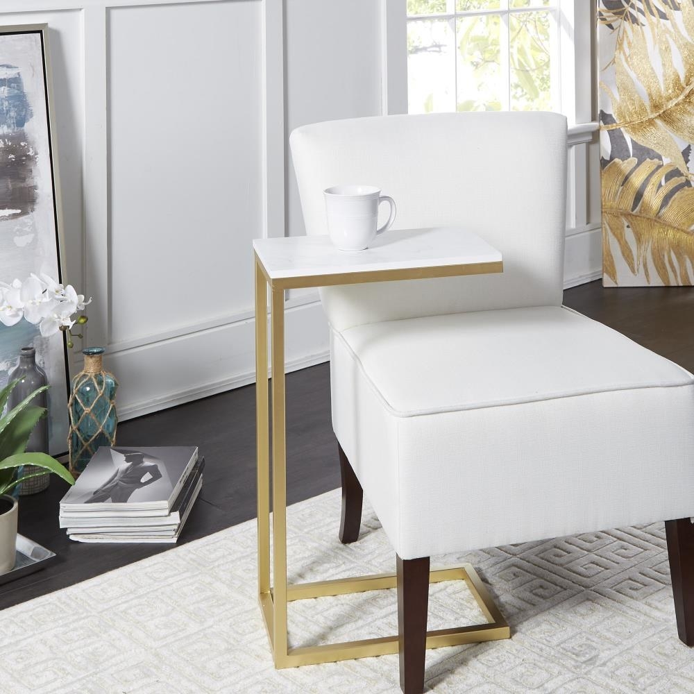 the end table with a mug on top