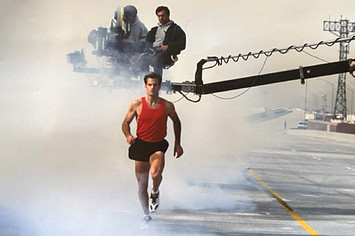 Actor Steen Davies runs on the 105 Freeway in Los Angeles on the set of David Lynch's The Wall ad for Adidas