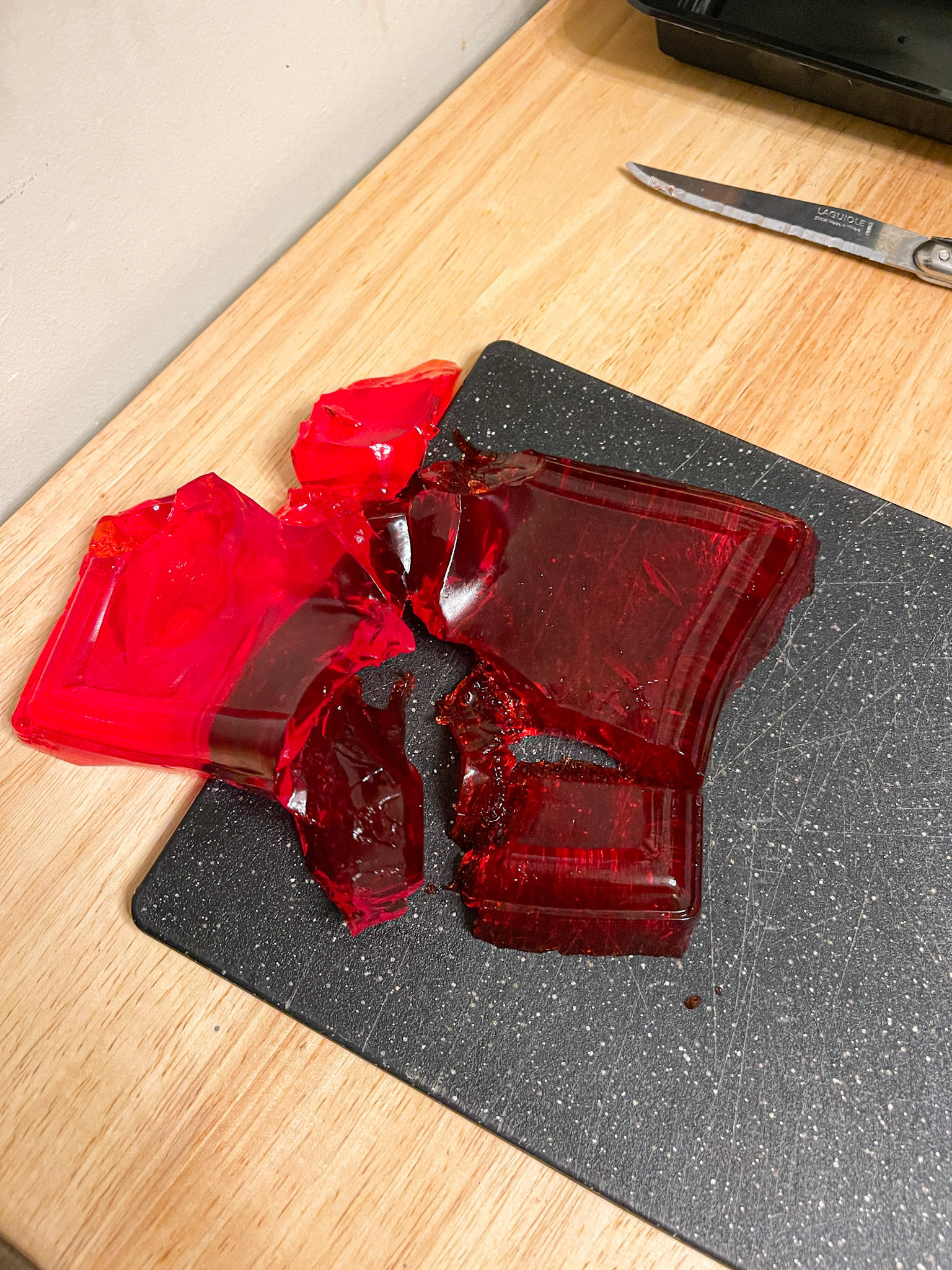 collapsed jello in pieces on cutting board