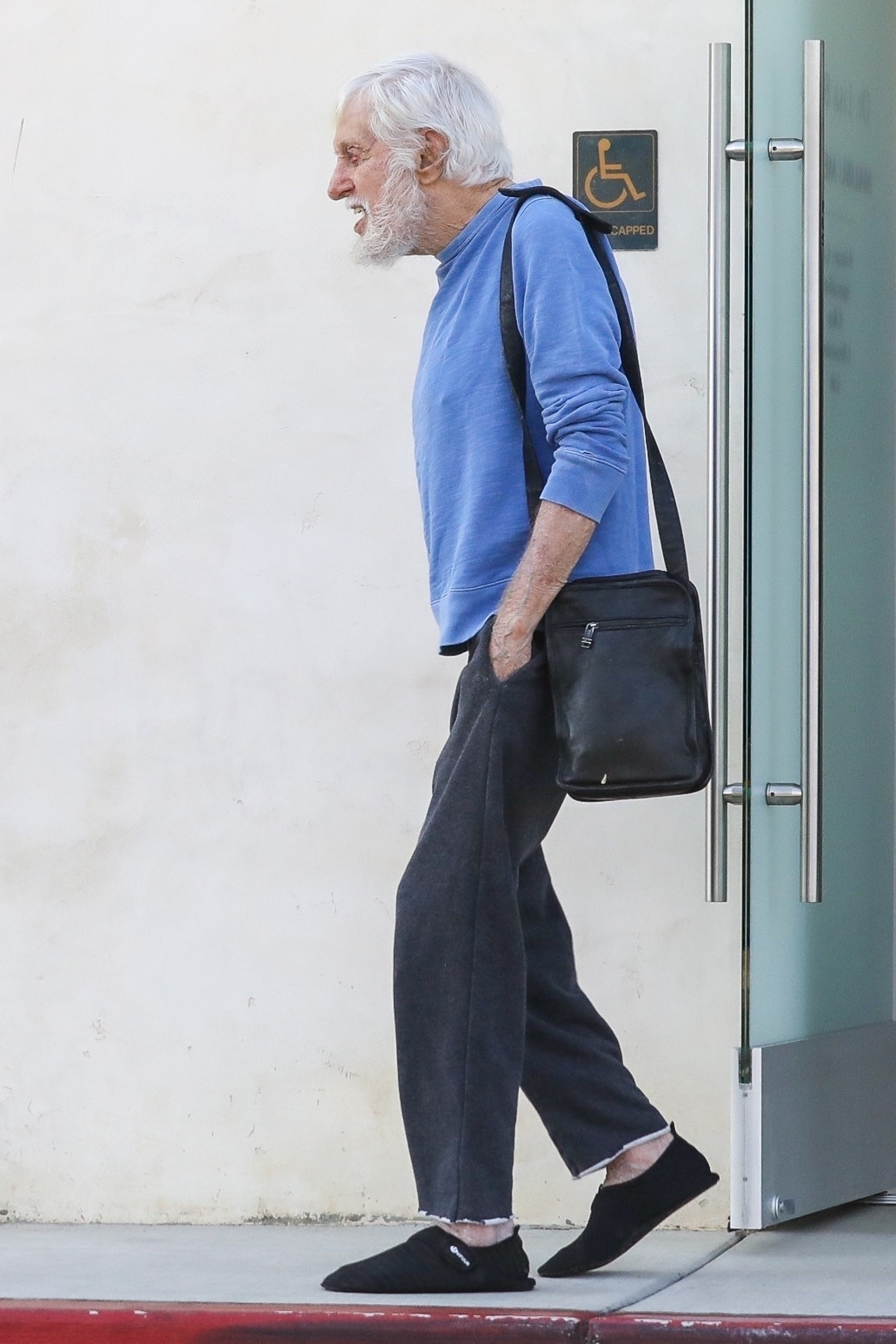 dick van dyke walking outside with comfy slippers