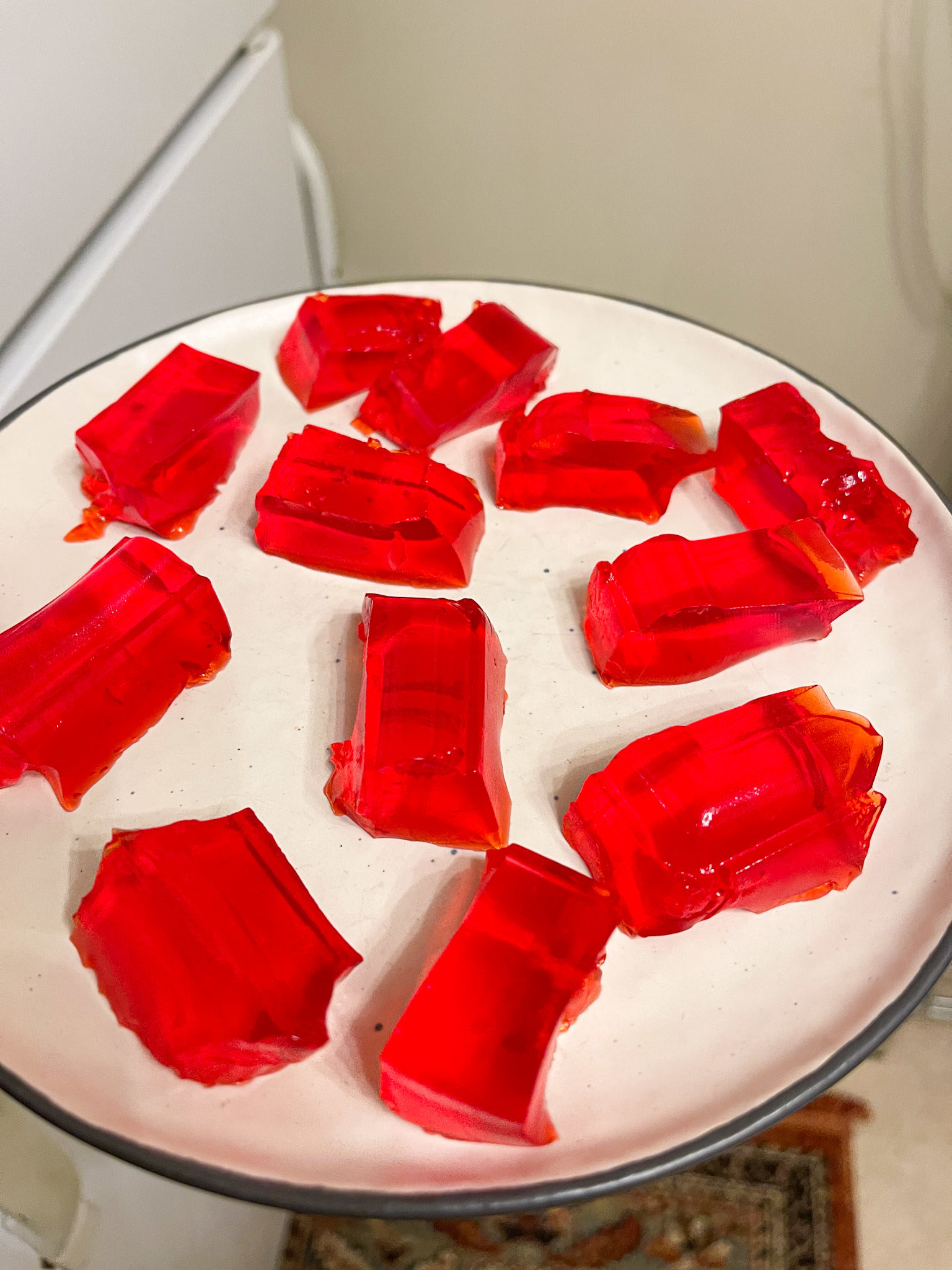 rectangles of red jello on a plate