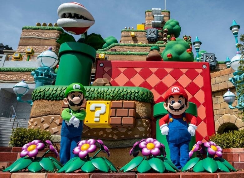 view of mario and luigi standing next to a punching block