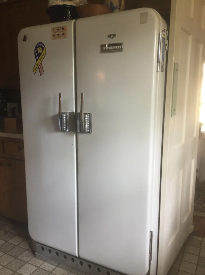 A very old two-door fridge