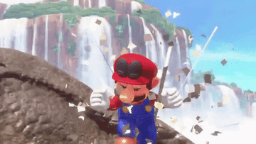 Mario jumping in the air with confetti flying behind him