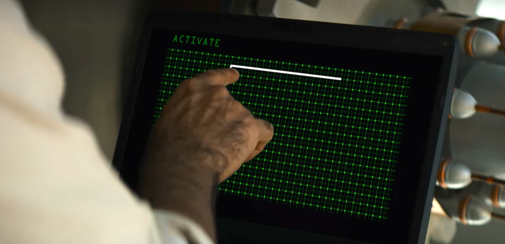 Man making a pattern on a computer screen