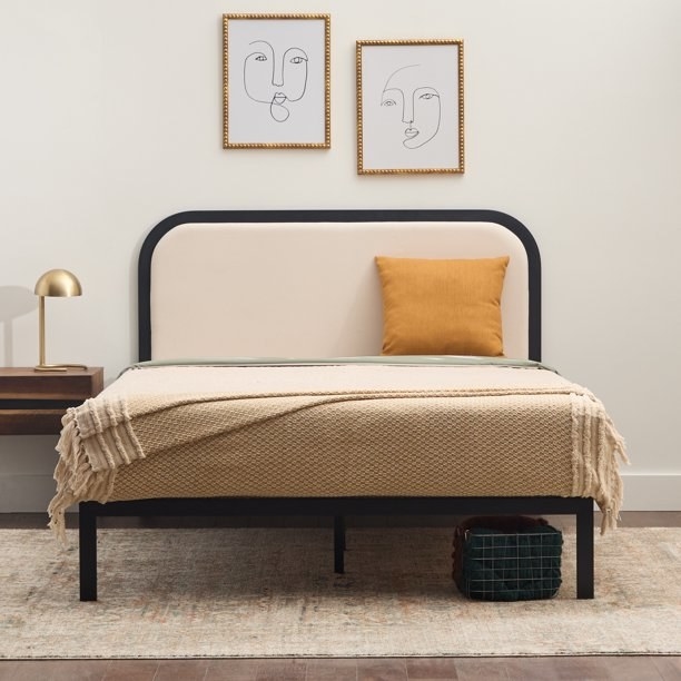 the Rest Haven metal platform bed in a spare, modern bedroom