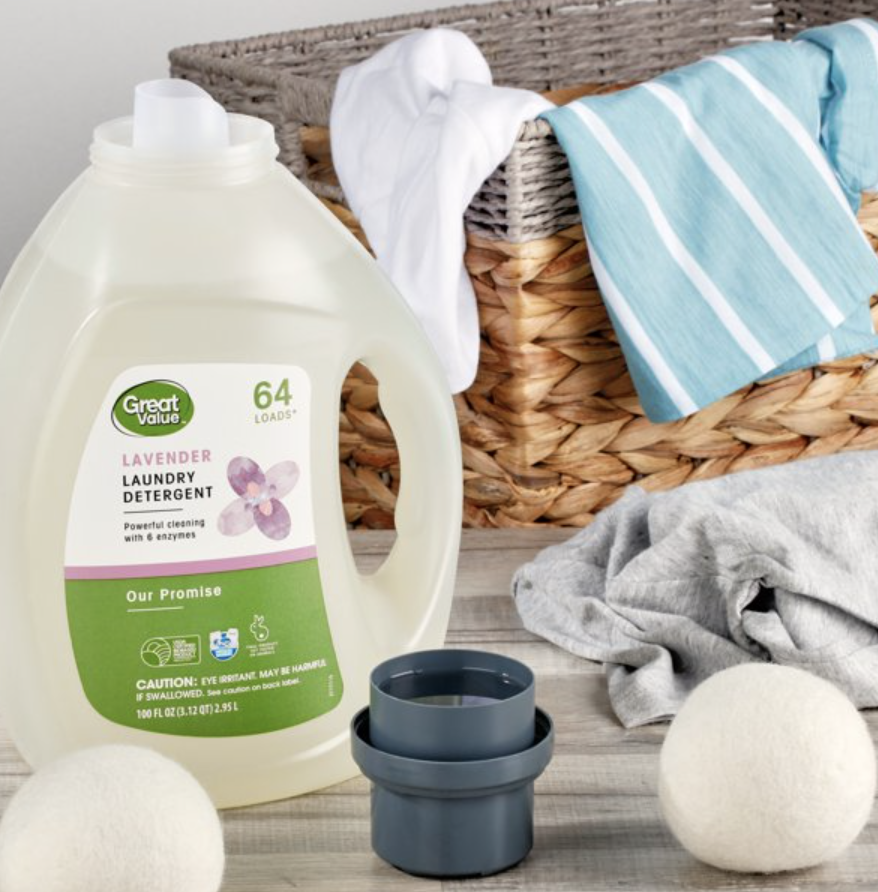 Great Value Our Promise lavender laundry detergent next to basket of laundry