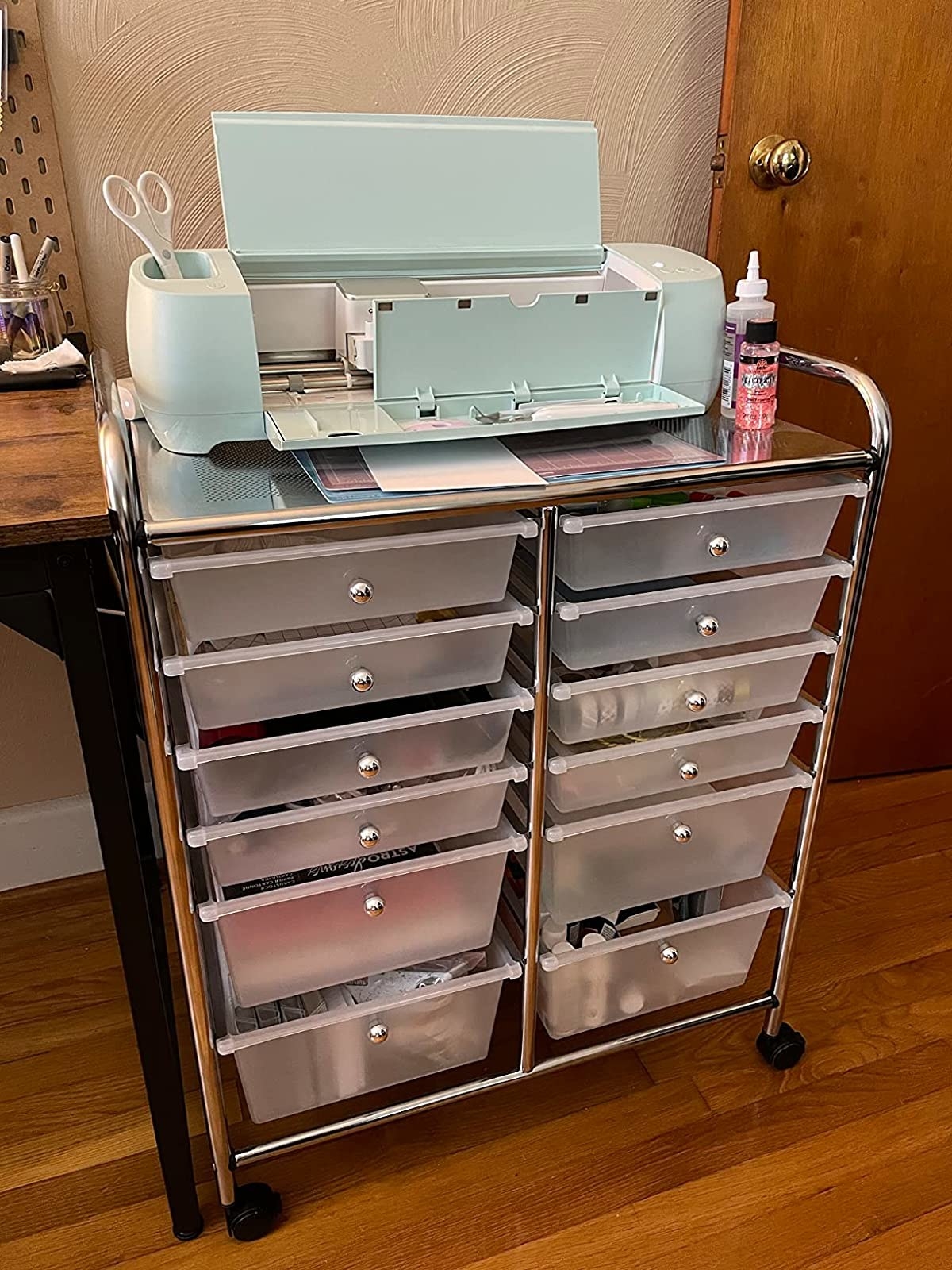 Reviewer image of rolling cart with Cricut cutter on top