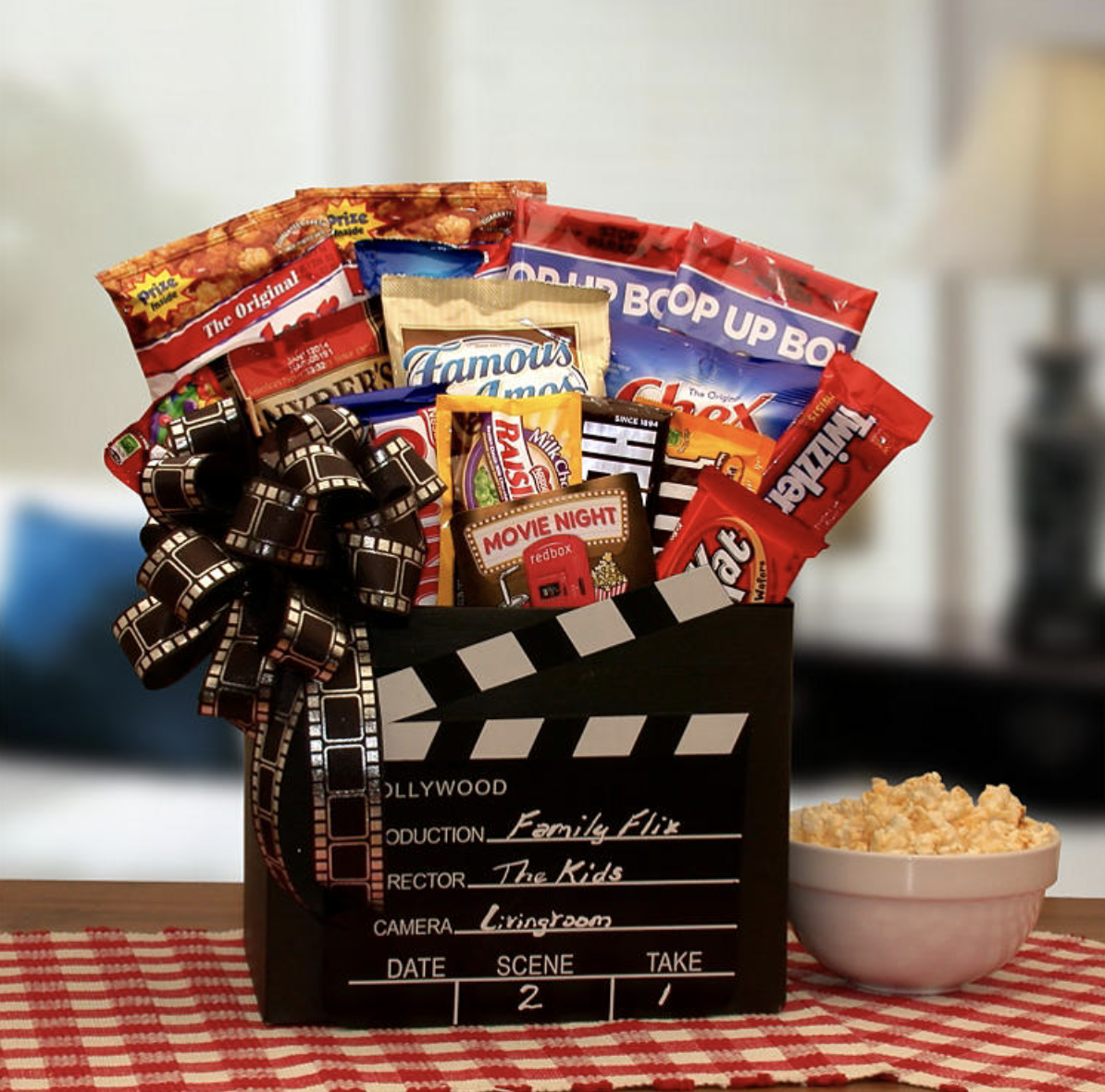 Movie snacks and redbox gift card in movie clapboard box