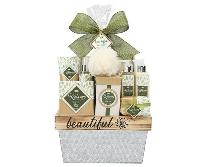 Luffa, green tea lotion, soaps, body mist, and more in metal planter with the word &quot;beautiful&quot; on it
