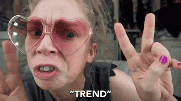 a woman saying, &quot;Trend&quot; and waving her fingers in quotes